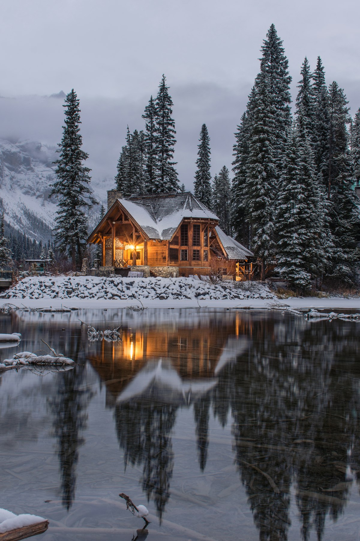 Winter cabin in snow